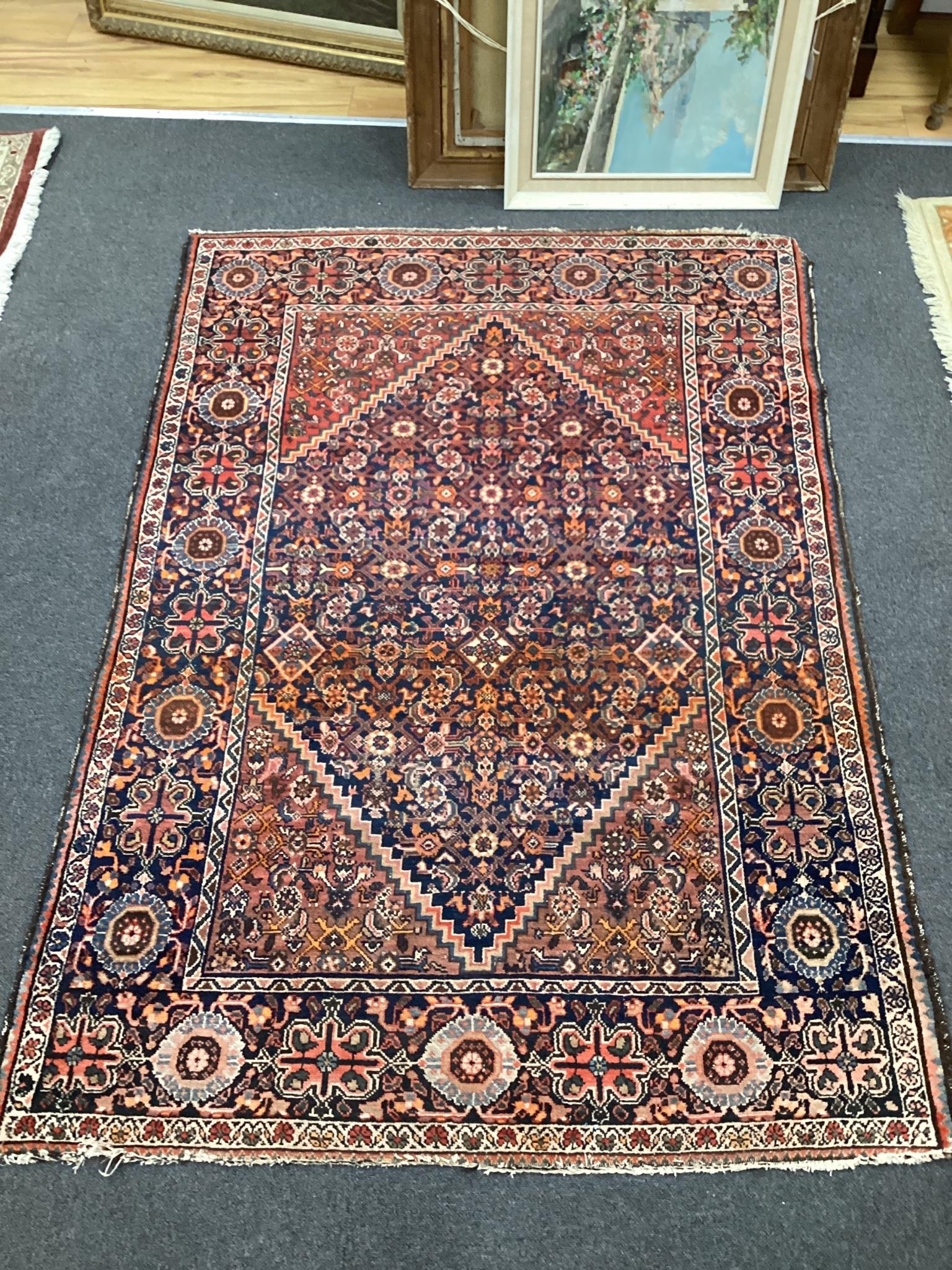 A Hamadan blue ground rug, 196 x 131cm